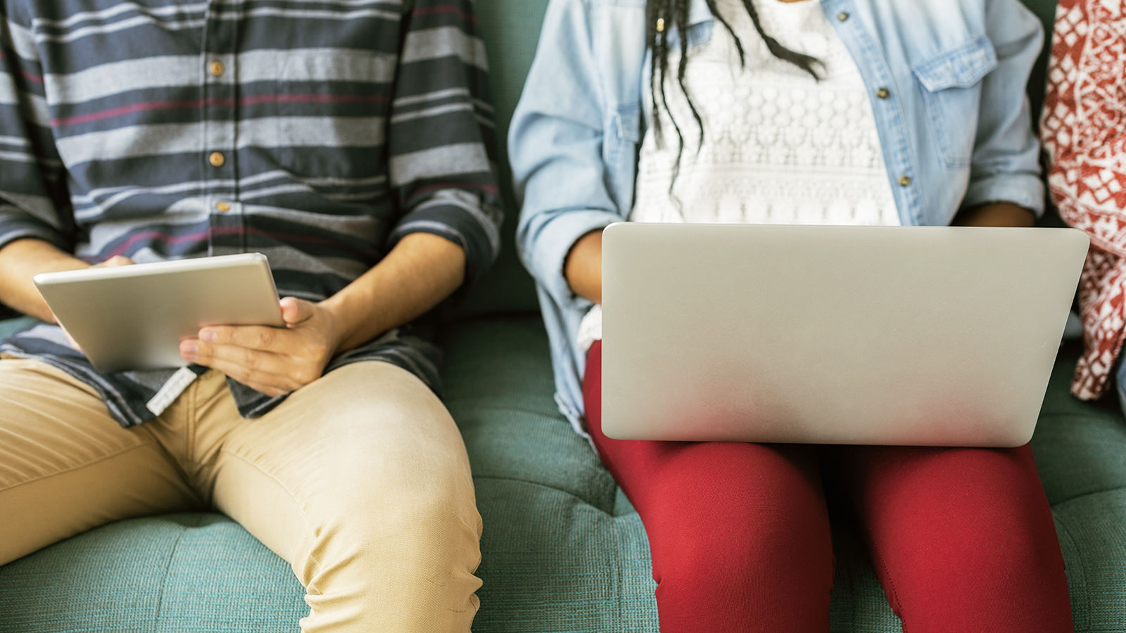 Cropped man and woman using electronic device free image
